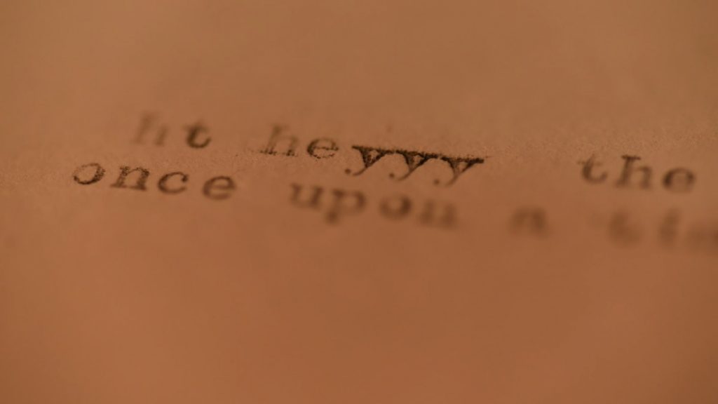 A close up of a piece of paper with words on it